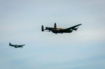 Avro Lancaster And Spitfire Mk1 At Airbourne Stock Photo