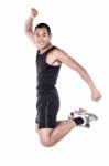 Young Man Jumping In The Air! Stock Photo