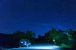 Many Star At The Night Sky With The Car On The Road Stock Photo