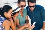 Portrait Of Group Of Friends Having Fun With Smartphones Stock Photo