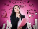 Asian Woman Thinking Many Ideas On Business Background Stock Photo