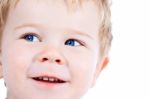 Toddler Blond And Blue Eyes Boy Child With Various Facial Expres Stock Photo