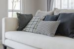 Modern White Sofa In Modern Living Room With Pillows Stock Photo