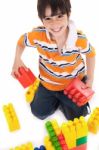 Boy Playing With Blocks Stock Photo