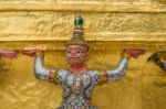 The Giant Statue Supporting Golden Pagoda In The Temple Of The Emerald Buddha (wat Phra Kaew) , Bangkok, Thailand Stock Photo