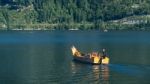 Traditional Flat Bottomed Boat On Lake Hallstatt Stock Photo