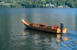 Traditional Flat Bottomed Boat On Lake Hallstatt Stock Photo