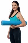 Fitness Woman With A Gym Mat Stock Photo