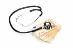 Professional Stethoscope Lying On Stack Of Euro Notes Stock Photo