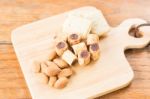 Savoury Snack On Wooden Dish Stock Photo