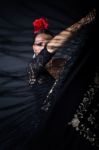 Young Flamenco Dancer In Beautiful Dress On Black Background Stock Photo