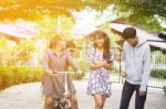 Group Of Asian Teenager Walking In The Park  Stock Photo