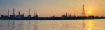 Beautiful Sun Rising Scene With Oil ,gas Refinery Industry Estat Stock Photo