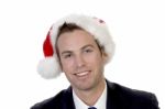 Smart Businessman  With Santacap Stock Photo