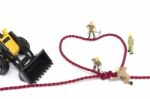 Miniature Worker Team Building Heart Shaped With Rope Stock Photo