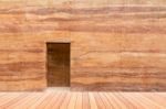 Stone Wall With Door And Wood Floor In Front Off Stock Photo