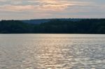 Beautiful Background With The Lake And The Forest On The Sunset Stock Photo