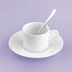 White Cup On Purple Background Solid Stock Photo