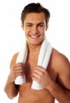 Smiling Man holding gym towel Stock Photo