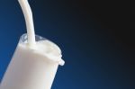 White Milk In Glass Stock Photo