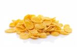 Sweet, Tasty Cornflakes, Dry Crispy On White Background Stock Photo