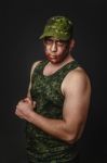 Military Style Camouflage On The Soldier's Face Stock Photo