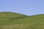 Bare Green Hills Stock Photo