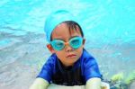 Boy With Swimming Accessories Stock Photo