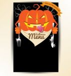 Scary Pumpkin Holding Spoon And Knives For Halloween Menu Stock Photo