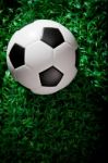 Soccer Football On Green Grass Field Stock Photo