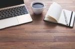 Office Desk With Laptop And Coffee Cup Stock Photo