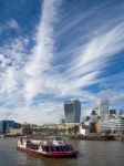 Tourist Boat Cruising Along The River Thames Stock Photo