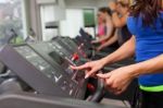 Woman Running On Treadmill Stock Photo