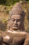 Statue Of Ancient Khmer Warrior Head At Angkor Wat Stock Photo