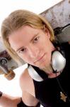 Handsome Guy With Skateboard Stock Photo