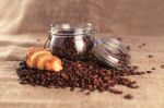 Coffee Beans And Croissant Stock Photo