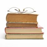 Glasses on Old Books Stock Photo