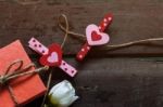 Heart And Gift On A Wooden Stock Photo