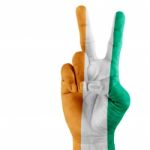 Flag Of Ivory Coast  On Victory Hand Stock Photo