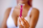 Pink Hair Attractive Woman Hold Pink Female Shaver In Hand Stock Photo