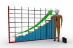 Business Man Standing Near A Financial Graph Stock Photo