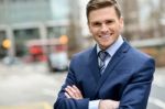 Smiling Businessman Posing For The Camera Stock Photo