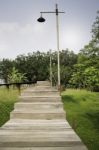 Wooden Walkway To Tropical Garden Stock Photo