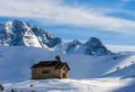 View Of A Chapel In The Dolomites At The Pordoi Pass Stock Photo