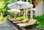 Beach Chairs And Umbrella Stock Photo