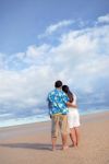 Lovers On The Beach Stock Photo