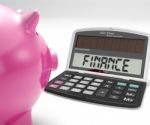 Finance Calculator Shows Revenue Income And Success Stock Photo