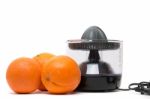 Automatic Orange Juicer Machine Stock Photo