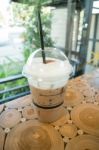 Coffee Mocha Into A Plastic Glass Stock Photo