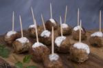 Skewers Of Meat On Wooden Cutting Board Stock Photo